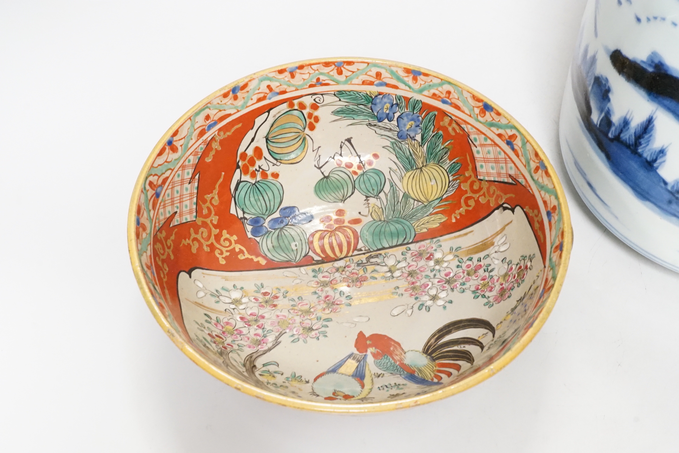 A large Japanese Arita blue and white sake flask and a Kutani bowl, largest 26cm tall